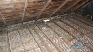 Attic space of an older home prepared for a polyurethane spray foam vapour seal